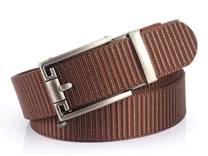 Close-up of brown nylon belt showing the matte silver alloy automatic buckle and texture