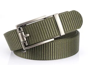 Detail of military green nylon belt with matte brushed metal automatic buckle
