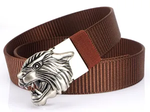 Detailed close-up of dark brown nylon tactical belt with a silver tiger head alloy buckle