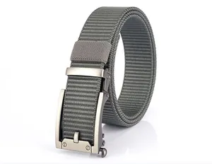 Macro view of military grey nylon tactical belt with a matte alloy automatic buckle