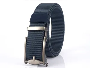 Close-up of dark blue nylon woven belt featuring a brushed metal automatic buckle