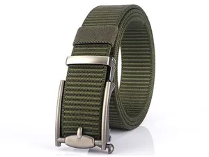 Close-up of olive green tactical nylon belt showing woven texture and metal buckle