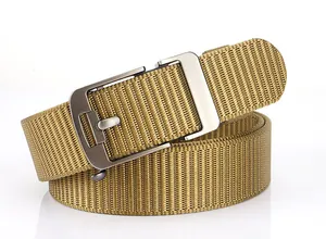Macro shot of khaki nylon tactical belt with matte silver alloy buckle in outdoor style