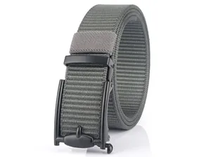 Detail of grey tactical nylon belt featuring a matte black automatic metal buckle