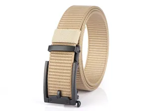 Close-up of khaki nylon web belt with matte black metal automatic buckle and textured strap