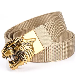 Tactical khaki nylon belt with a detailed golden tiger head buckle on white background