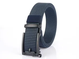 Close-up of navy blue nylon belt with matte black automatic buckle and textured weave