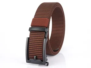 Close-up of brown nylon belt with woven texture and matte black automatic metal buckle