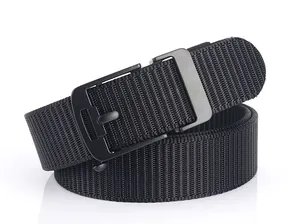 Macro detail of high-density black nylon woven belt with matte black metal buckle