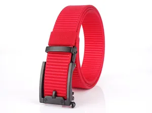 Close-up of red nylon belt with black matte automatic buckle for outdoor sports
