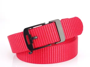 Close-up of red woven nylon belt with matte black buckle and detailed fabric texture