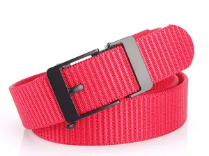 Detail of red woven nylon belt with a sleek matte black metal automatic buckle