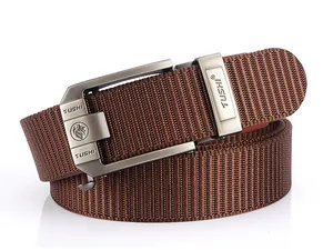 Close-up of brown thickened nylon web belt with brushed metal automatic lion buckle