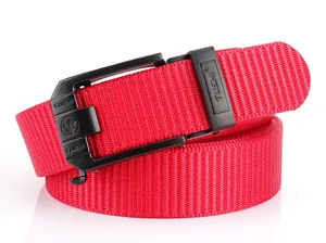 Close-up of red thick nylon belt with black matte automatic buckle and lion logo detail