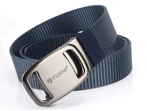 Detail of navy blue nylon belt with textured weave and matte gray metal automatic buckle