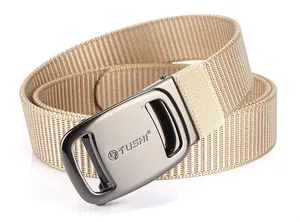Close-up of TUSHI metal buckle with khaki thickened nylon tactical belt texture