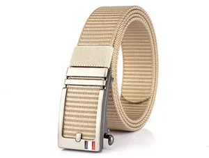 Detail of tan nylon belt with brushed metal automatic buckle and tri-color stripe accent