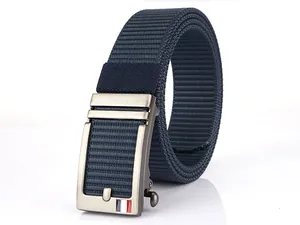 Detail of navy nylon belt with brushed silver automatic buckle and striped accent