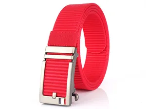 Detail of red woven canvas belt with silver-grey matte automatic buckle and stripe accent