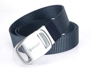 Close-up of matte silver metal buckle with TUSHI logo on navy blue woven nylon belt