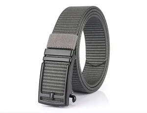 Detail of dark grey woven nylon belt with black matte metal automatic buckle and toggle