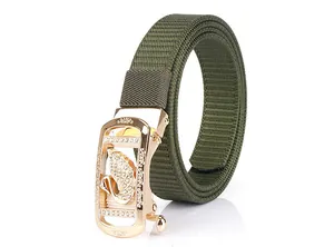 Detailed close-up of army green nylon belt with rose gold buckle and swan crystal inlay