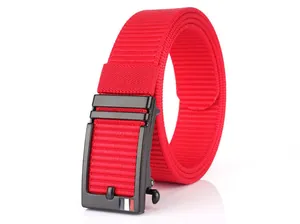 Detail of red nylon belt with black matte automatic buckle and tri-color decor