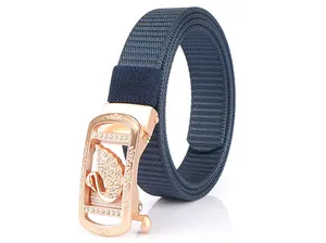 Detail of rose gold automatic buckle with sparkling swan design on woven navy blue belt