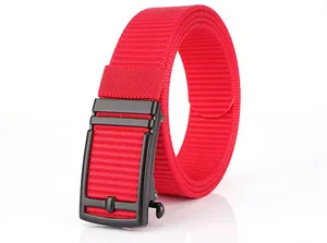 Close-up of a durable red nylon tactical belt with a matte black automatic metal buckle
