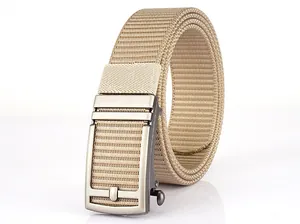 Macro view of khaki woven nylon tactical belt with silver automatic metal buckle