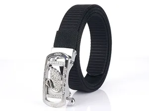 Detailed view of silver automatic buckle with swan rhinestone design on black nylon belt