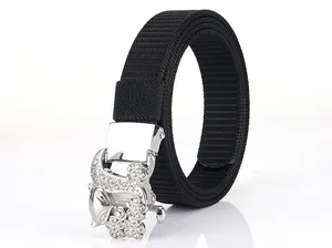 Detail of fox-shaped alloy buckle with sparkling rhinestones on black nylon belt