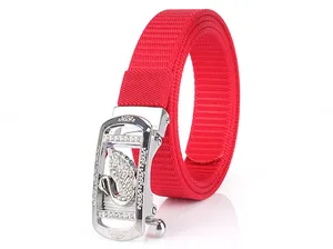 Detail of red nylon belt with silver automatic buckle featuring a crystal swan design