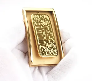 Macro shot of gold 304 stainless steel belt buckle with leopard texture and brand logo