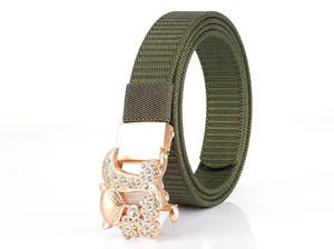 Detailed macro view of military green nylon belt with fox-shaped rose gold buckle
