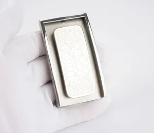 Detail view of 304 stainless steel belt buckle featuring pebble texture and TUSHI logo