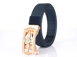 Detailed close-up of rose gold alloy buckle with intricate hollow cross and blue nylon strap