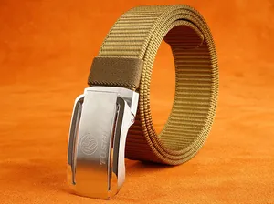 Close-up of khaki nylon belt with brushed silver metal buckle and TUSHI logo