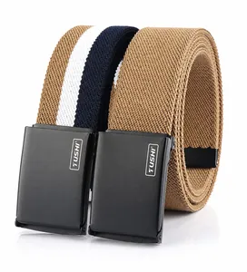 Dettaglio di cinture in tela elastica kaki e tricolore con fibbie in metallo nero intrecciato