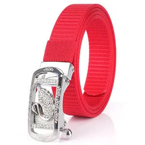 Red woven nylon belt featuring a sparkling silver swan automatic buckle with rhinestones