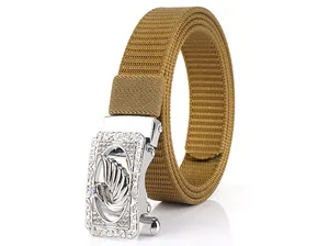 Detailed close-up of the khaki nylon belt featuring a silver crystal swan buckle