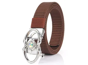 Detail of a brown nylon woven belt with silver automatic buckle and iridescent rhinestones