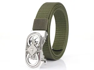 Detail of army green nylon belt with a silver automatic metal buckle and diamond accents