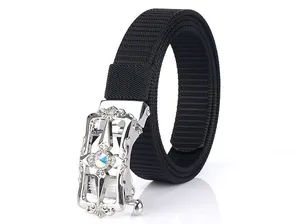 Detail view of nylon belt with ornate silver floral buckle and iridescent gemstone inlay