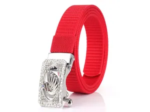 Macro detail of red nylon belt showing silver alloy buckle with swan decorative motif