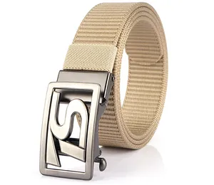Detail view of khaki tactical nylon belt with textured weave and metallic automatic buckle