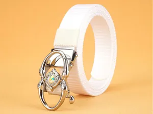Detail of white nylon belt featuring a silver leopard head buckle with a large central crystal