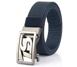 Detailed macro view of navy blue nylon woven belt with a brushed metal automatic buckle