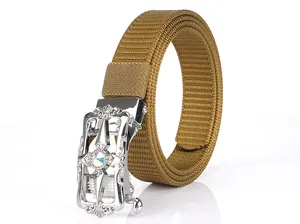 Detail of automatic alloy buckle with vintage hollow carving and rainbow gemstone inlay