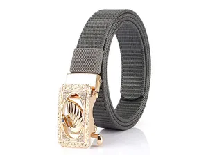 Detail of grey nylon belt featuring a gold buckle with crystal swan and diamante trim